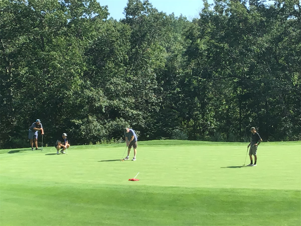 Image of Solid State Community Golf Tournament in action