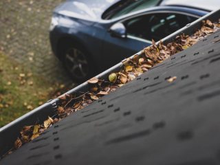 Gutters In Need Of Cleaning For Roof Maintenance