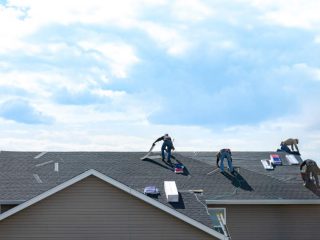 Asphalt roof being installed on central ma home